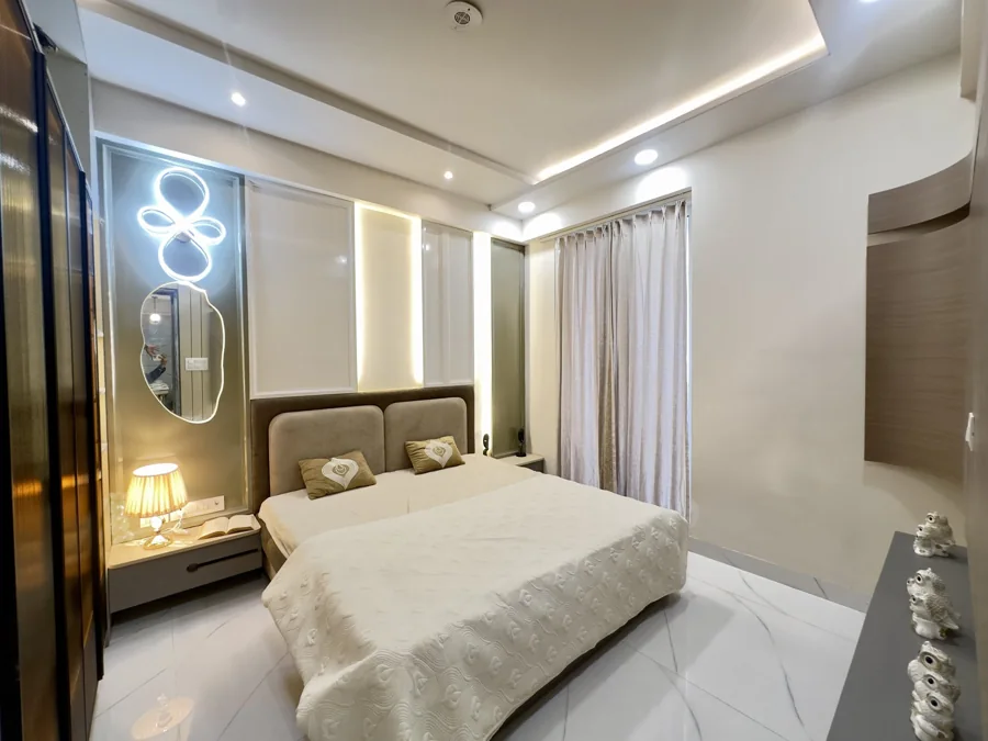 Kalyan EVA actual 3 BHK flat · Bedroom with upholstered headboard